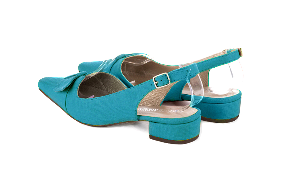 French elegance and refinement for these turquoise blue dress slingback shoes, with a knot, 
                available in many subtle leather and colour combinations. The pretty French spirit of this beautiful pump will accompany your steps nicely and comfortably.
To be personalized or not, with your materials and colors.  
                Matching clutches for parties, ceremonies and weddings.   
                You can customize these shoes to perfectly match your tastes or needs, and have a unique model.  
                Choice of leathers, colours, knots and heels. 
                Wide range of materials and shades carefully chosen.  
                Rich collection of flat, low, mid and high heels.  
                Small and large shoe sizes - Florence KOOIJMAN